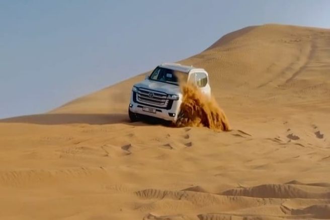 Dubai Morning Red Dune Desert Safari: Dune Bashing, Quad Biking, Sandboarding & Camel Ride