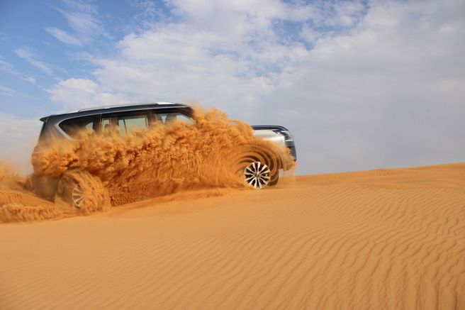 Dubai Morning Desert Safari with Sand Boarding and Camel Ride