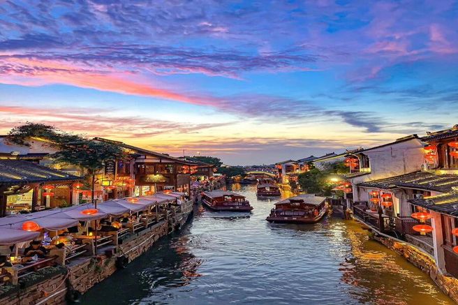 【独占割引】上海 烏鎮(ウーチェン) 水郷の村 夜景ツアー (VIPリムジン / 韓国語ガイド)