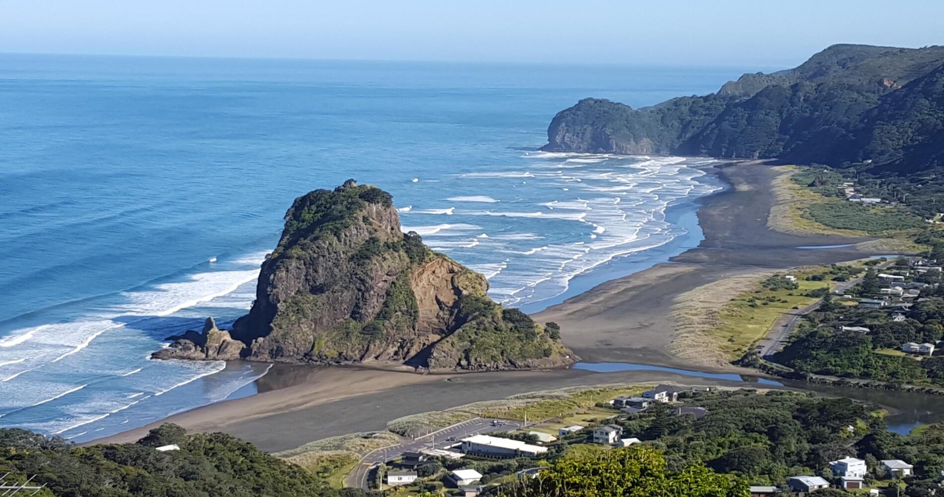 From Auckland: Piha Beach & Kitekite Falls Half-Day Tour - Hotel Pickup