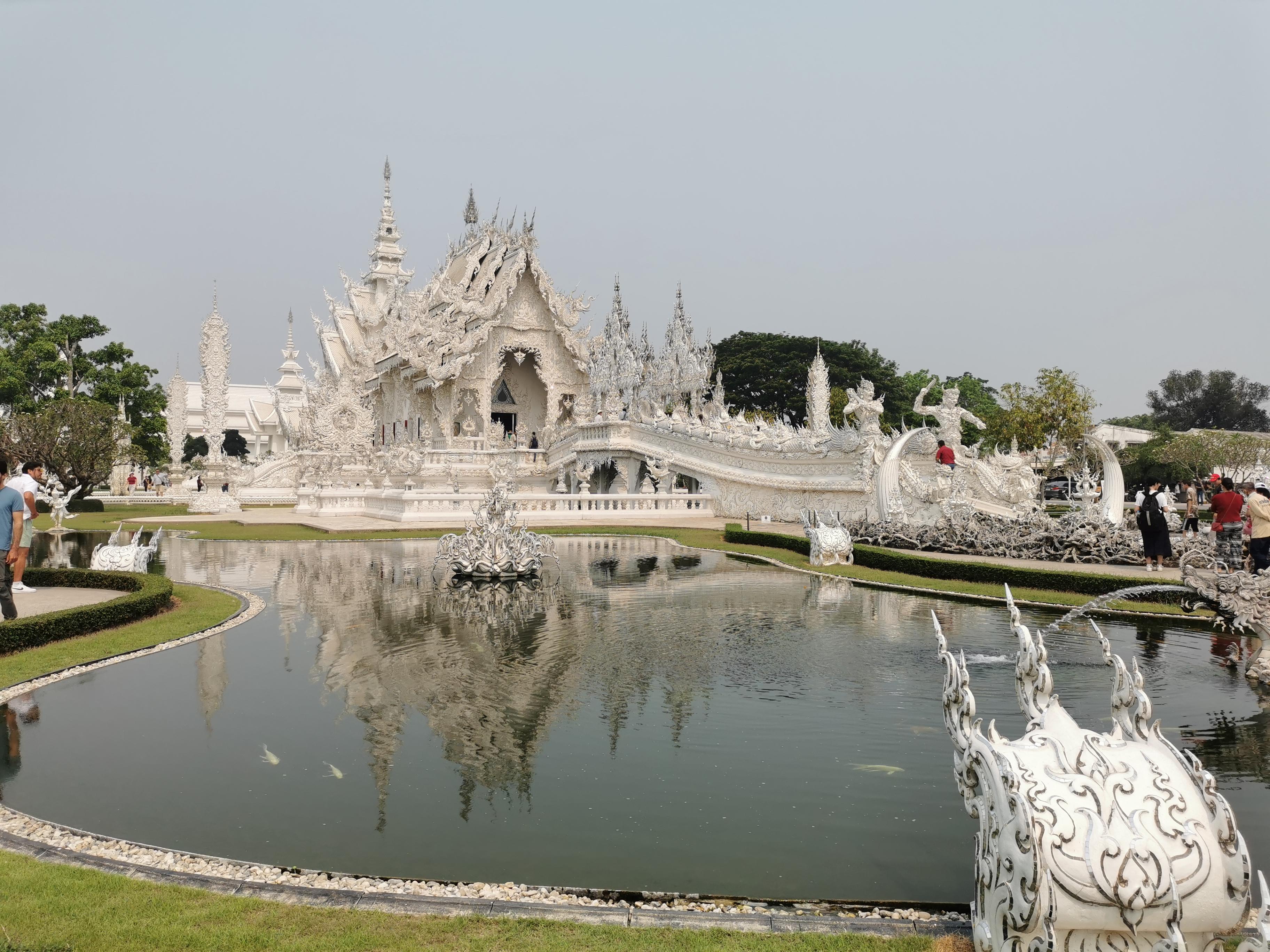 From Chiang Mai: Chiang Rai White and Blue Temples Black House and Golden Triangle Boat Tour