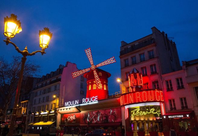 Paris: Moulin Rouge Show Ticket with Half Bottle of Champagne & Drop-off