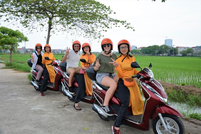 Hanoi Co Loa Citadel & Hoi Phu Village Women-Led Motorbike Tour - Hotel Pickup