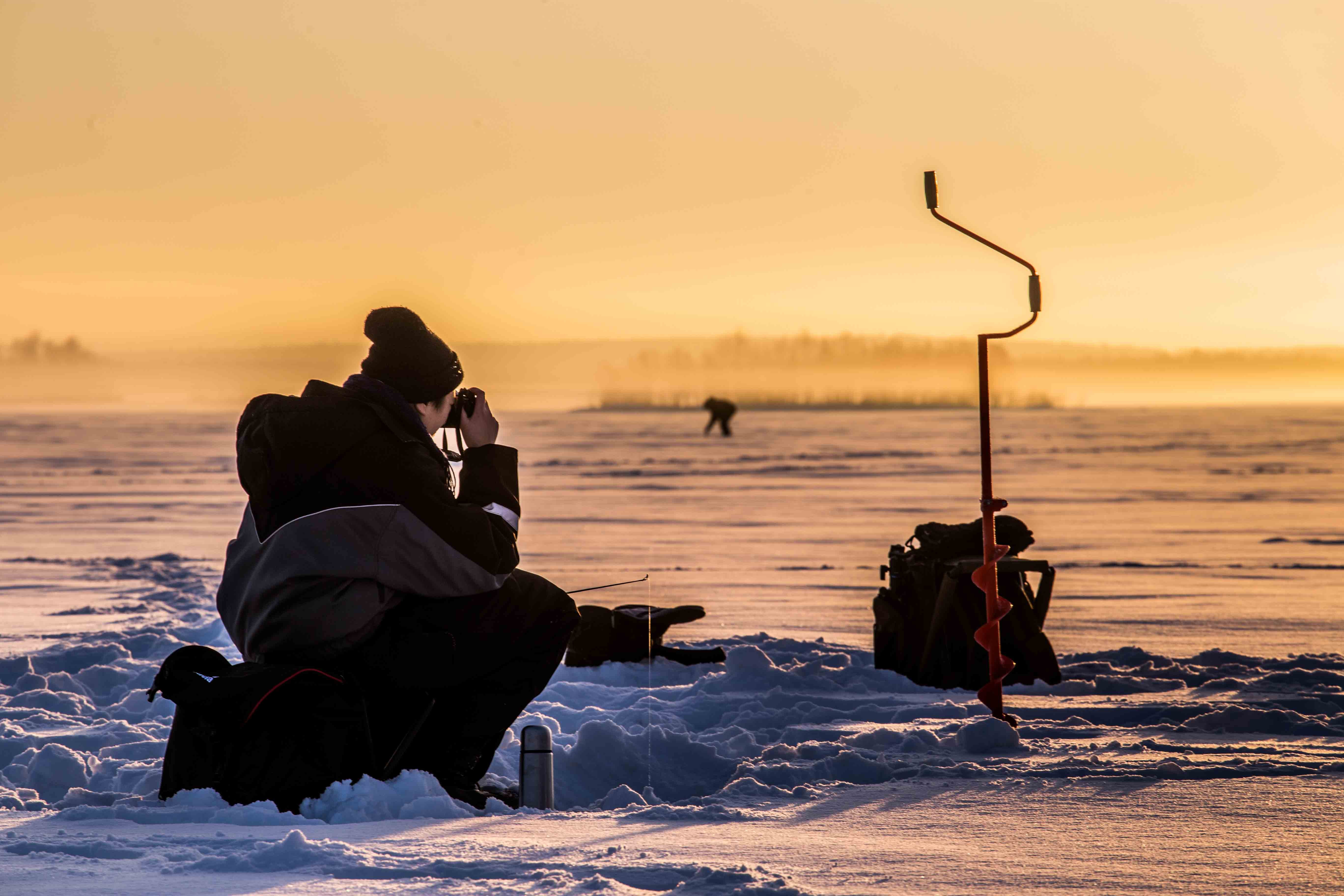 Levi Ice Fishing Experience on a Frozen Lake