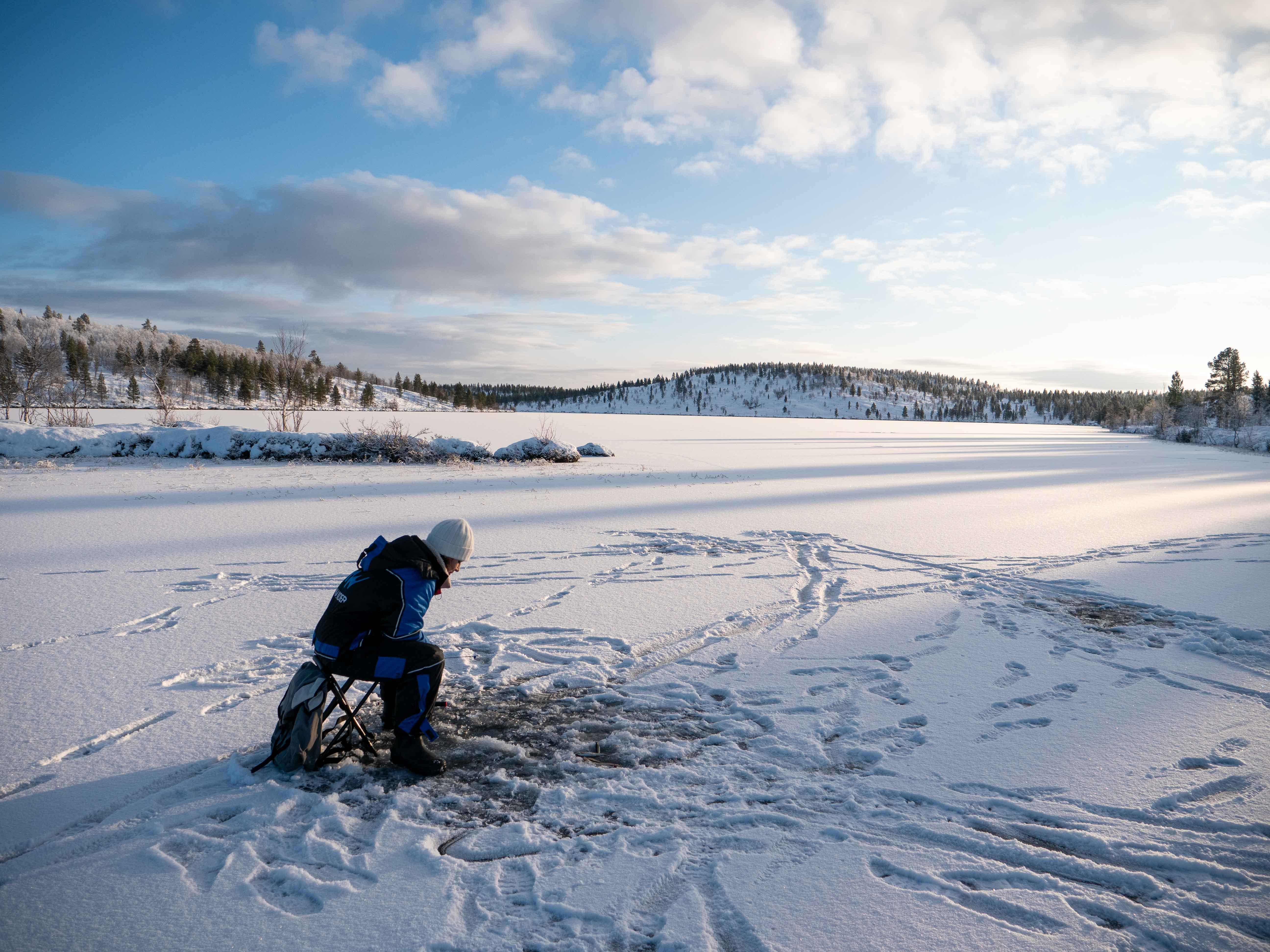 Ivalo Arctic Ice Fishing & Open-Fire Cooking Experience